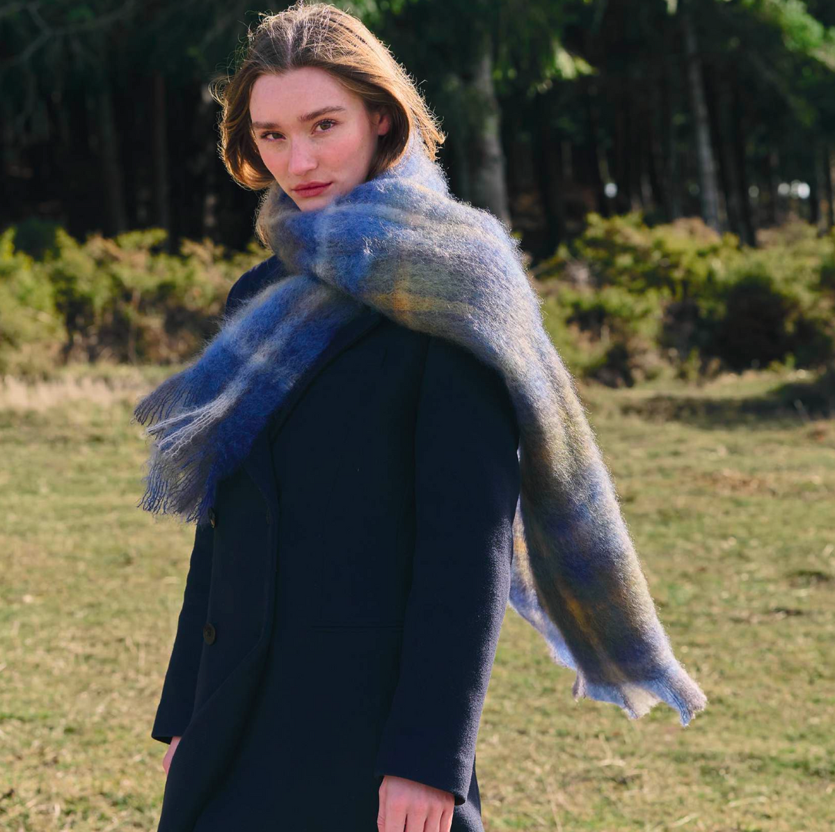 Light blue tartan mohair scarf from 814 Ezcaray, soft and cozy accessories with classic pattern and textured fabric.