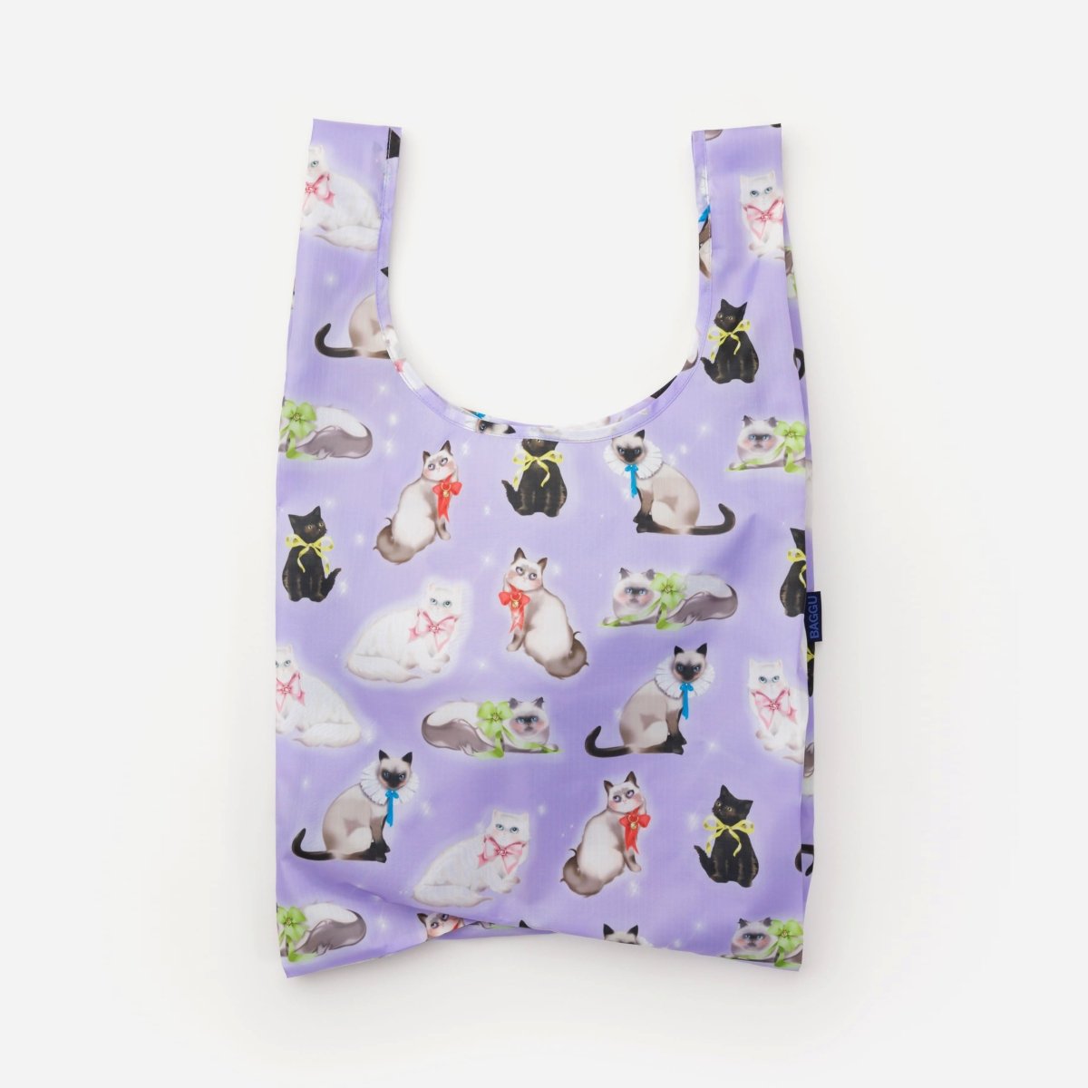 Baggu Fancy Cat Bag with colorful cat print on ripstop fabric, shown with handles and spacious main compartment.