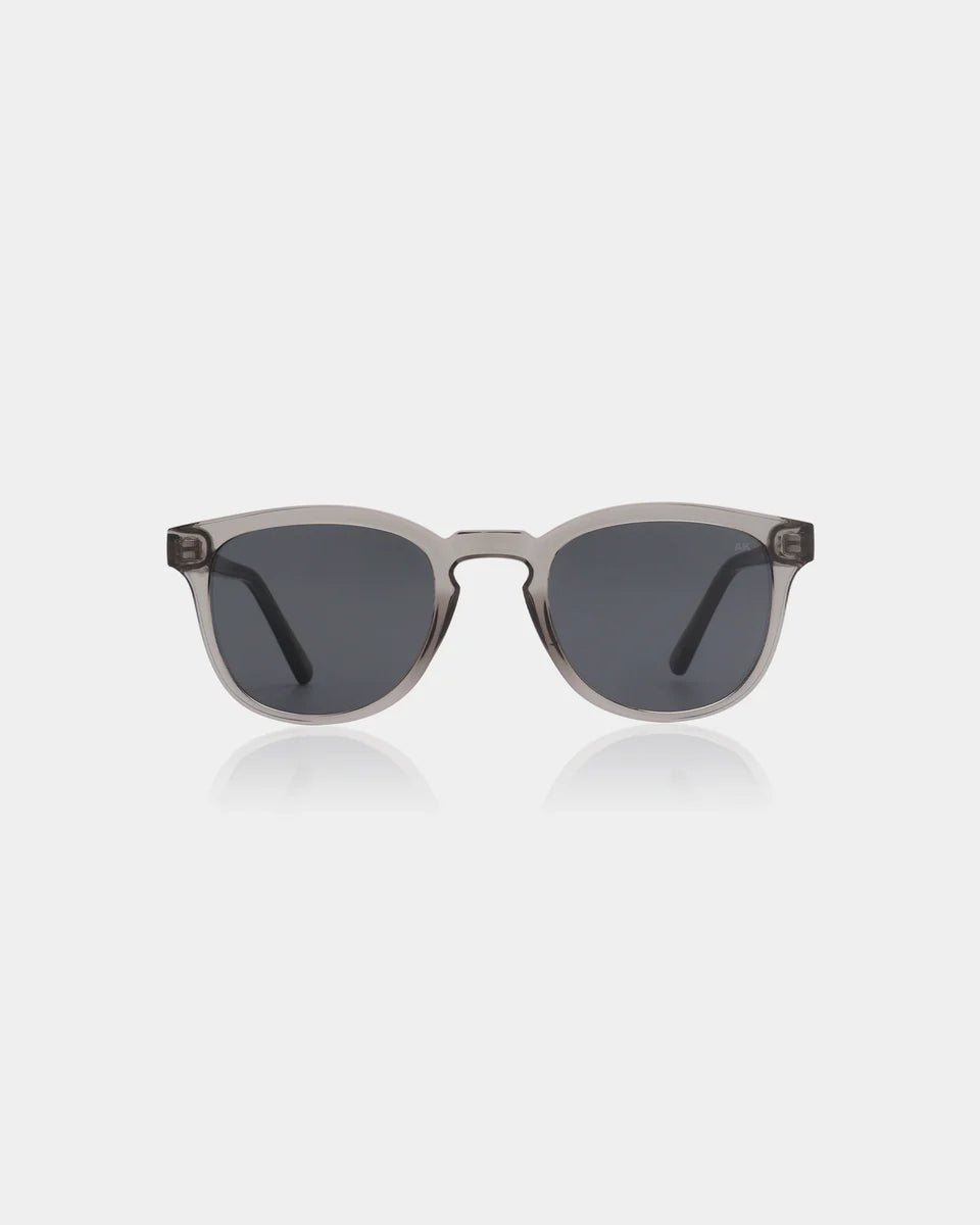 A. Kjaerbede Bate grey transparent sunglasses with round frames and tinted lenses, stylish and protective eyewear.