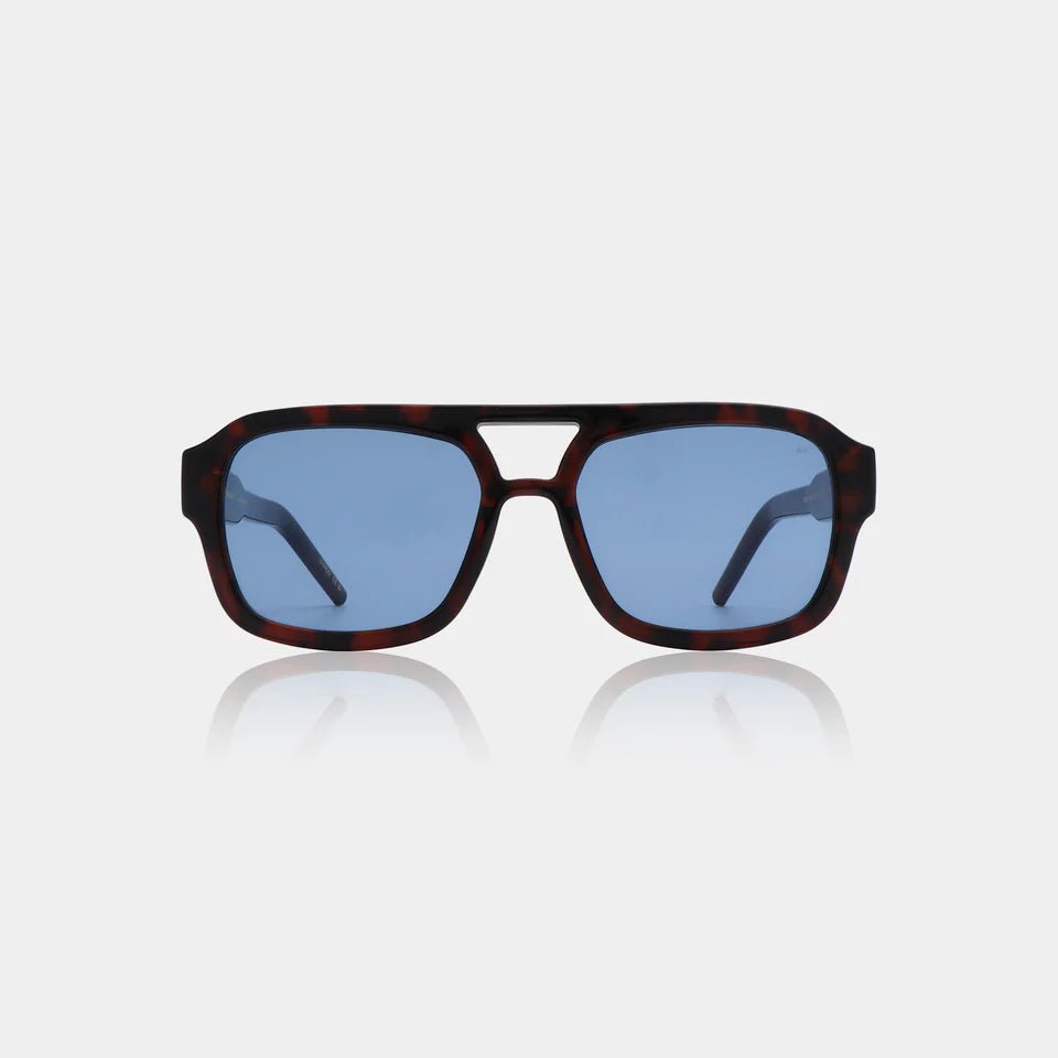 A. Kjaerbede Kaya sunglasses with dark tinted lenses and sleek black frames, stylish and UV-protective for sunny days.