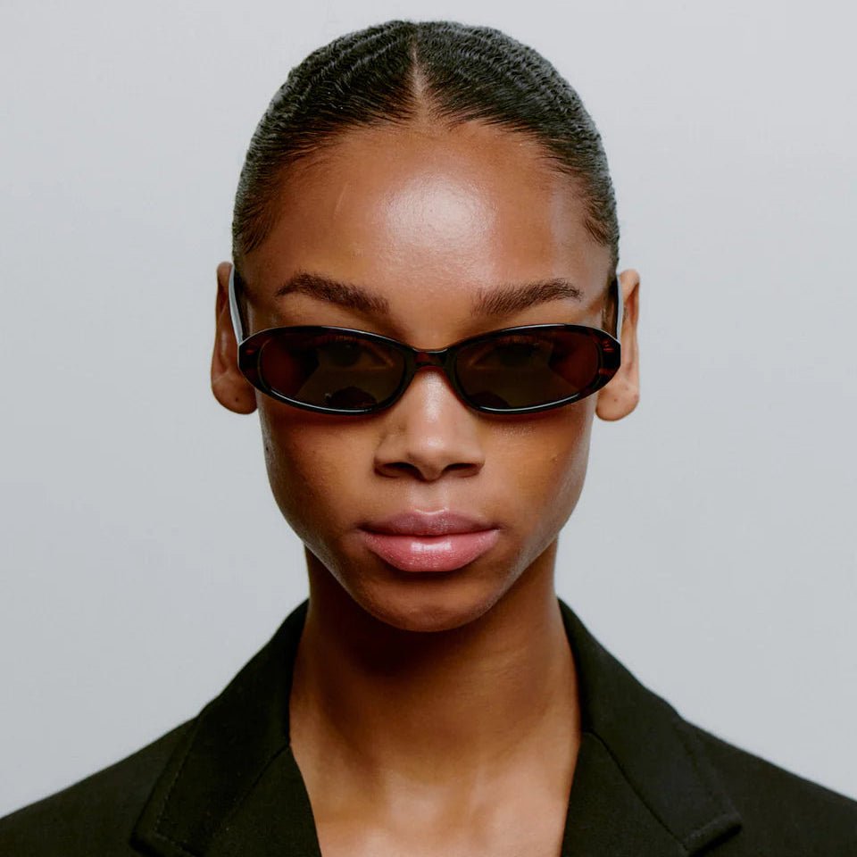 A. Kjaerbede Macy sunglasses with stylish frames and tinted lenses, showcasing a modern design for sun protection and fashion.