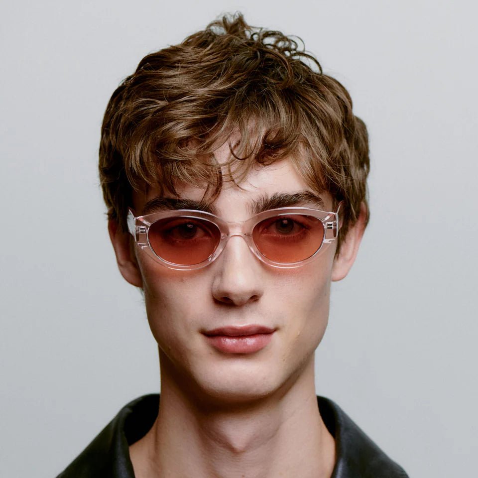 A. Kjaerbede Winnie sunglasses with stylish round frames and dark tinted lenses, perfect for casual outdoor wear.
