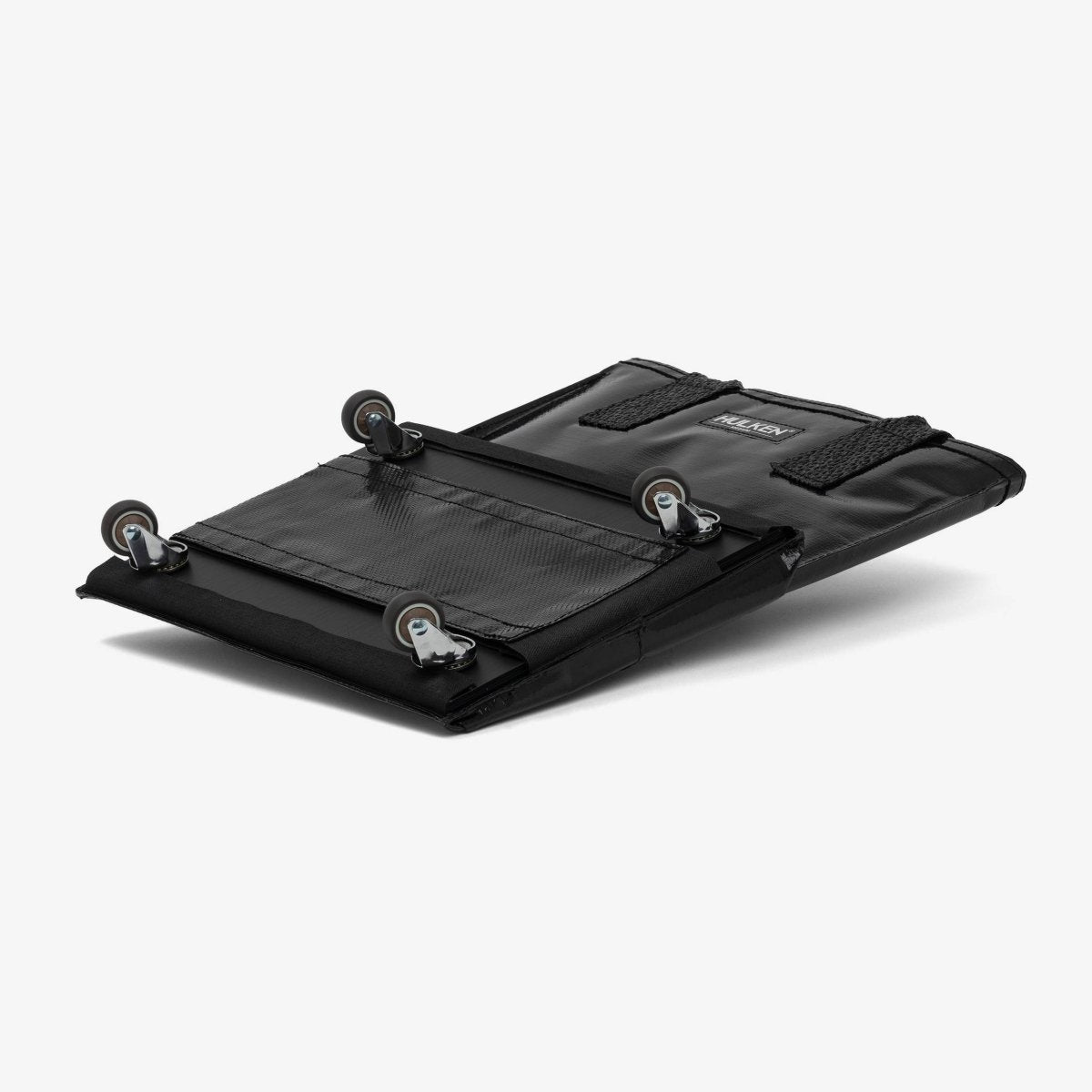 Hulken Medium Black Bag showing a sleek black fabric exterior with sturdy handles and a spacious interior.
