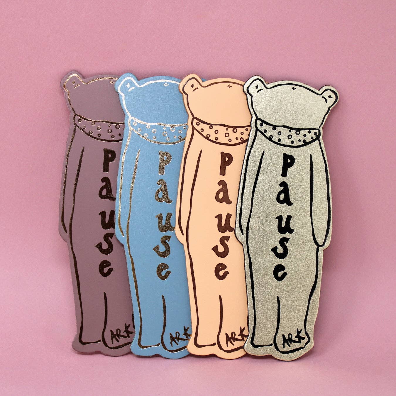 Gold bear-shaped bookmark by Ark Colour Design featuring a charming animal design for marking pages in books.