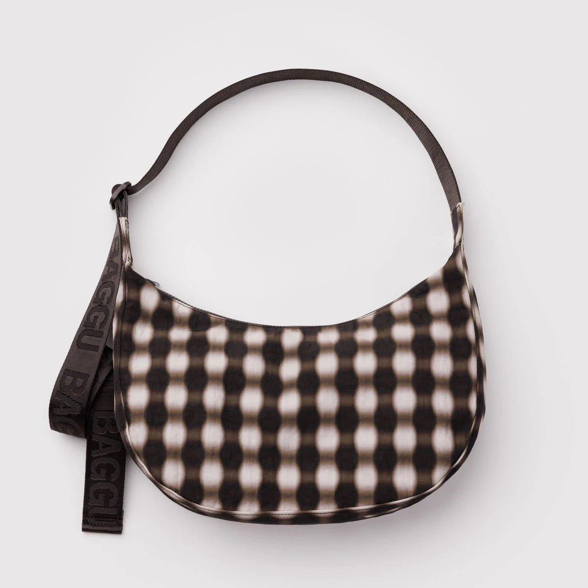 Baggu Crescent Shoulder Bag with adjustable strap and spacious interior, shown in a neutral color.