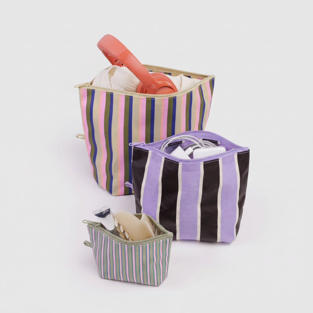 Set of striped fabric bags in various sizes on a white background