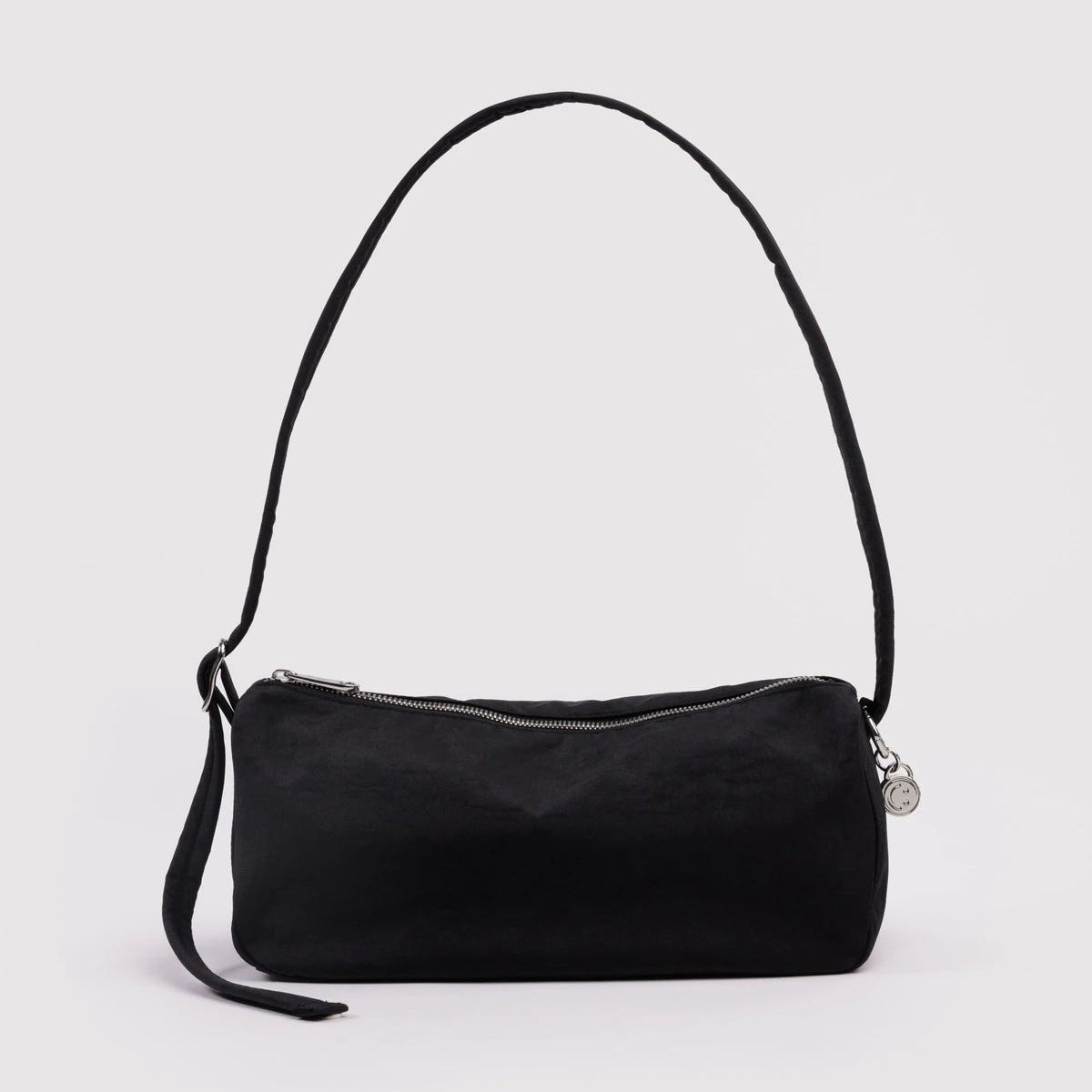 Baggu nylon loaf bag featuring a sleek, lightweight design with a top handle and spacious interior for everyday use.