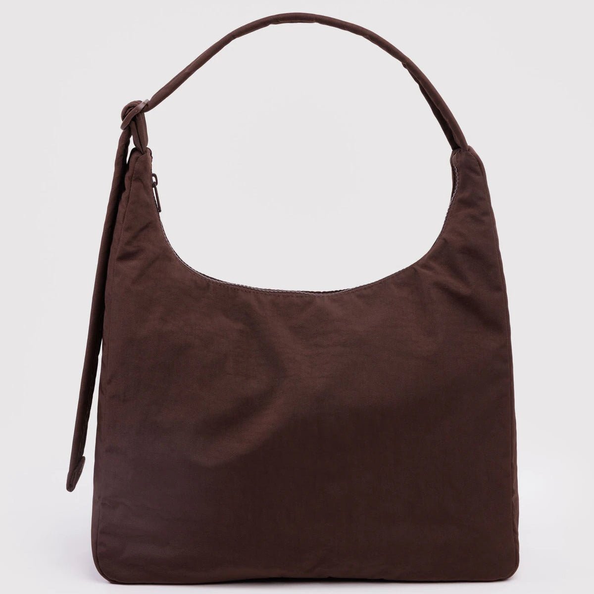 Brown shoulder bag on a light gray background