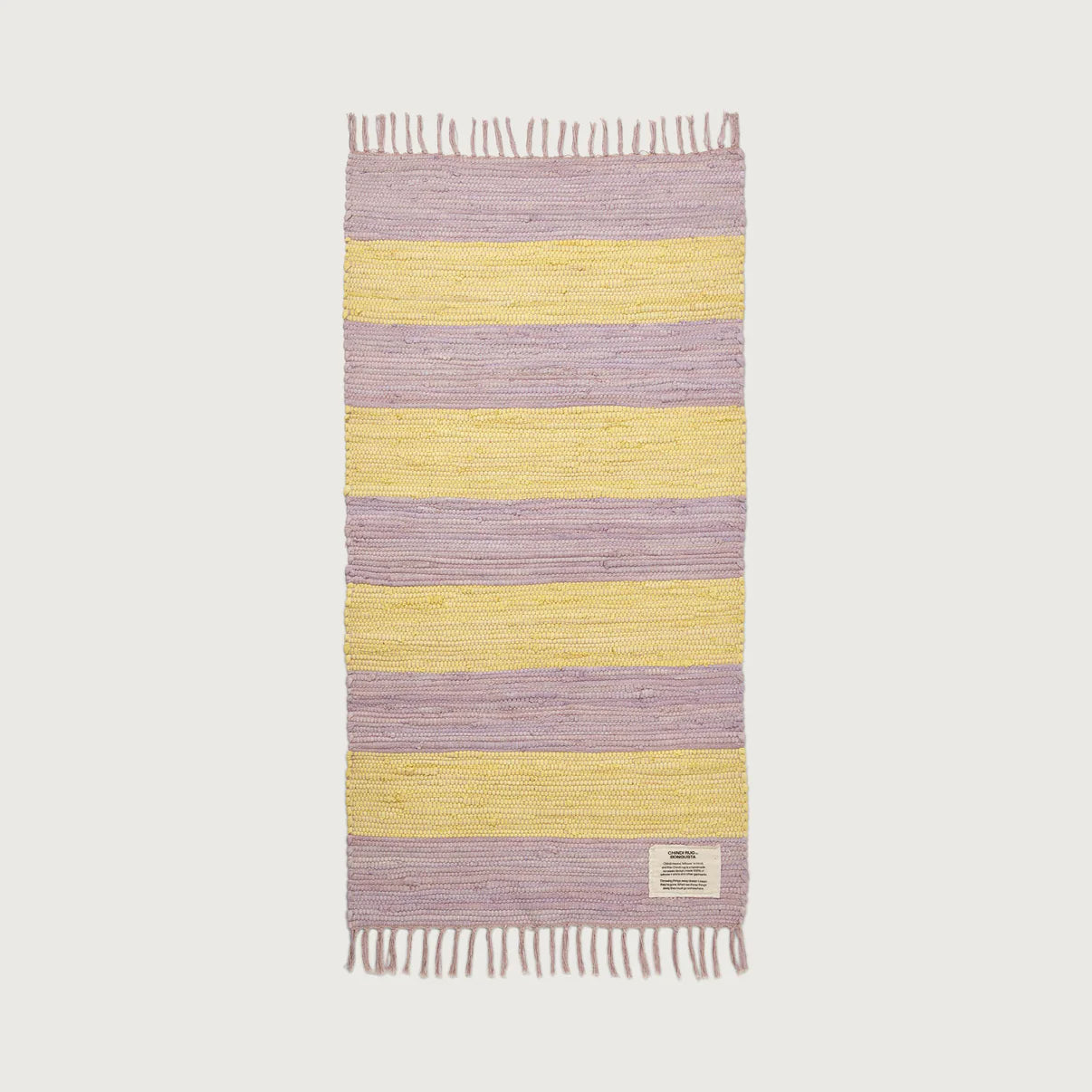 Bongusta Chindi Rug 60cm x 120cm with colorful woven design, perfect for adding texture and style to living spaces.