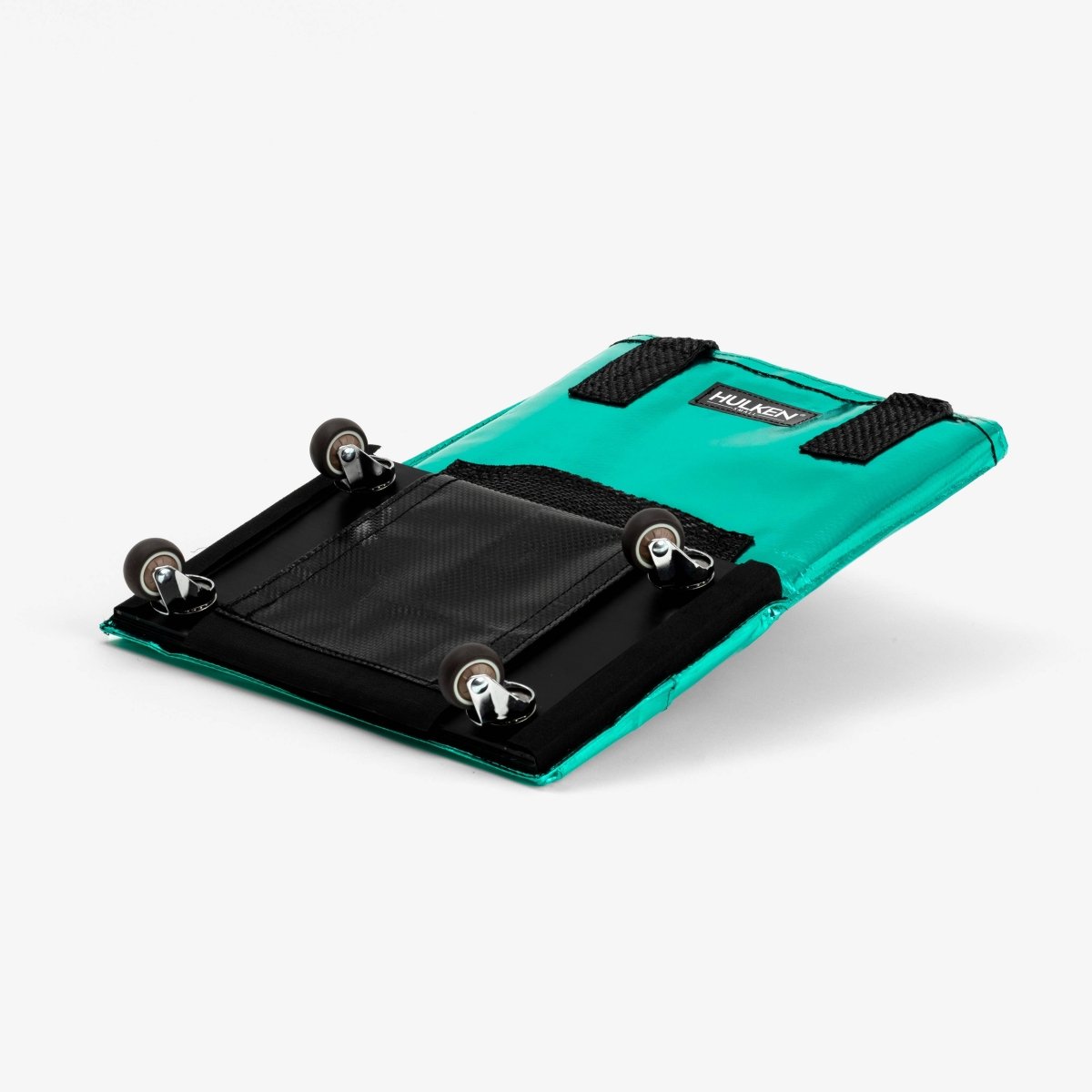 Small Hulken Bag in teal color with a compact design and sturdy handle, ideal for everyday use.