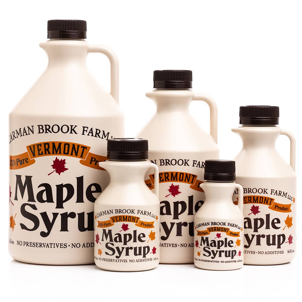 Carman Brook Farm Vermont Maple Syrup in a half-pint jar, amber rich taste, ideal for table use and sweetening dishes.
