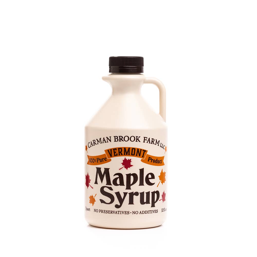 Carman Brook Farm Vermont Maple Syrup in a half-pint jar, showcasing amber color and rich taste, ideal for table use.