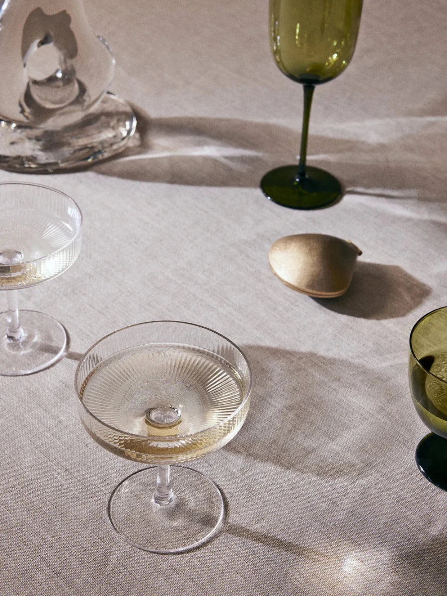 Clear ripple champagne glasses from Hallesches Haus' Mum's Big Night In Gift Set, perfect for celebratory moments.