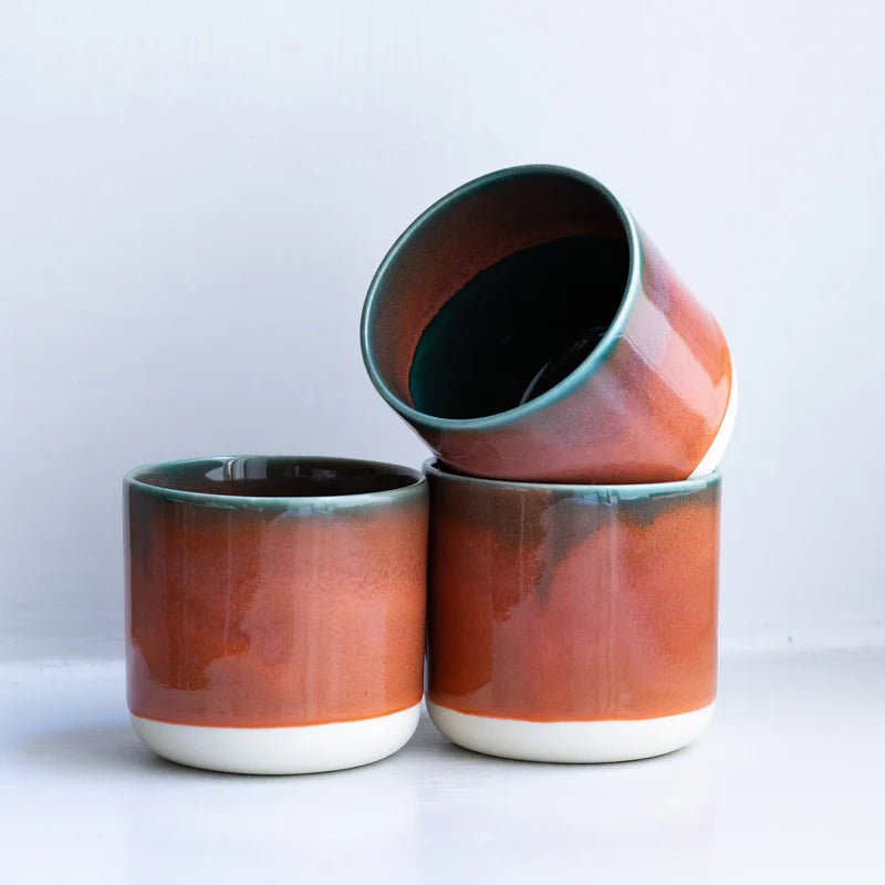 Ceramic Cobra Quench Cup by Studio Arhoj with vibrant, colorful glaze and unique artistic design.