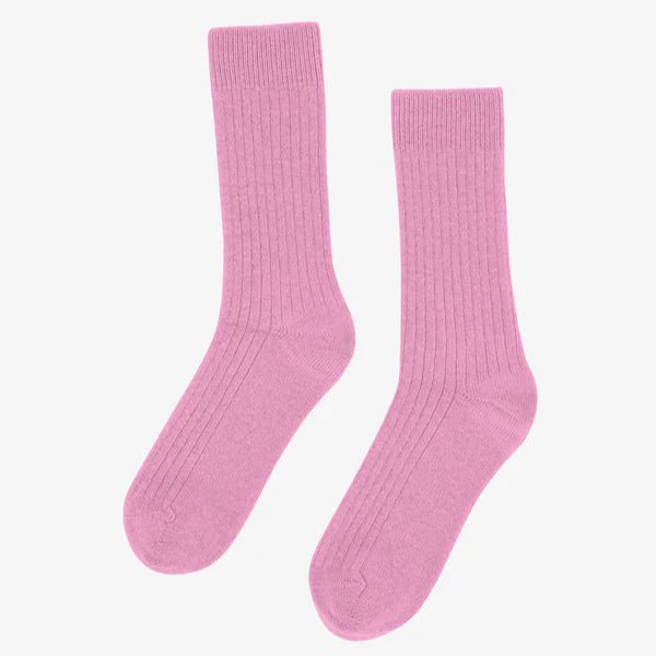 Colorful Standard merino wool blend socks featuring vibrant, colorful patterns and a comfortable fit.