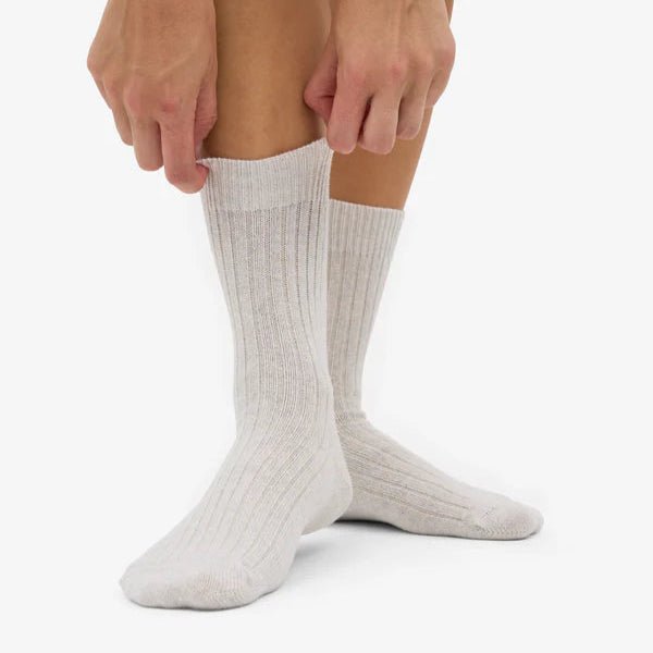 Colorful Standard merino wool blend socks in vibrant multicolor pattern, soft and comfortable for everyday wear.