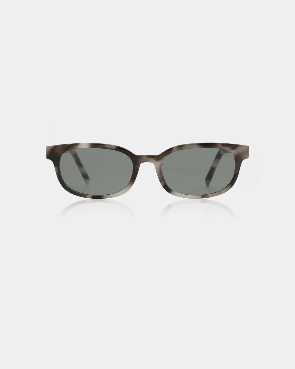 A. Kjaerbede Charlie sunglasses with cookie-dough colored frames and dark tinted lenses, stylish eyewear for sunny days.