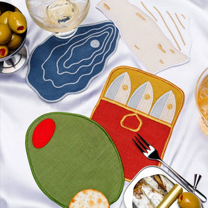 Colorful coasters with different designs on a white surface