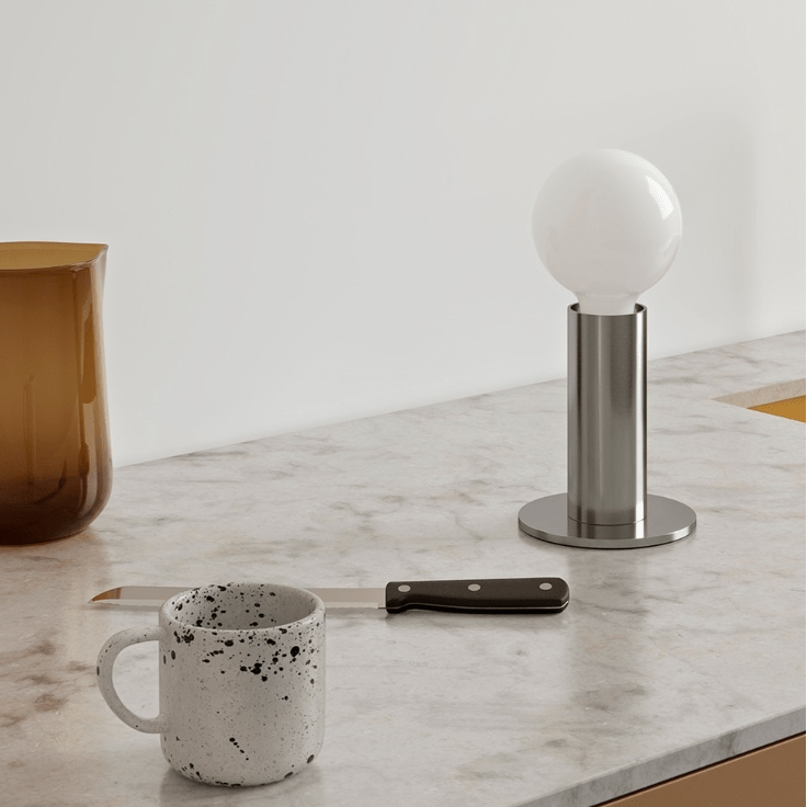 EDGAR Home SOL Lamp in 8 different colors, modern table lamp with vibrant, colorful glow and sleek design.