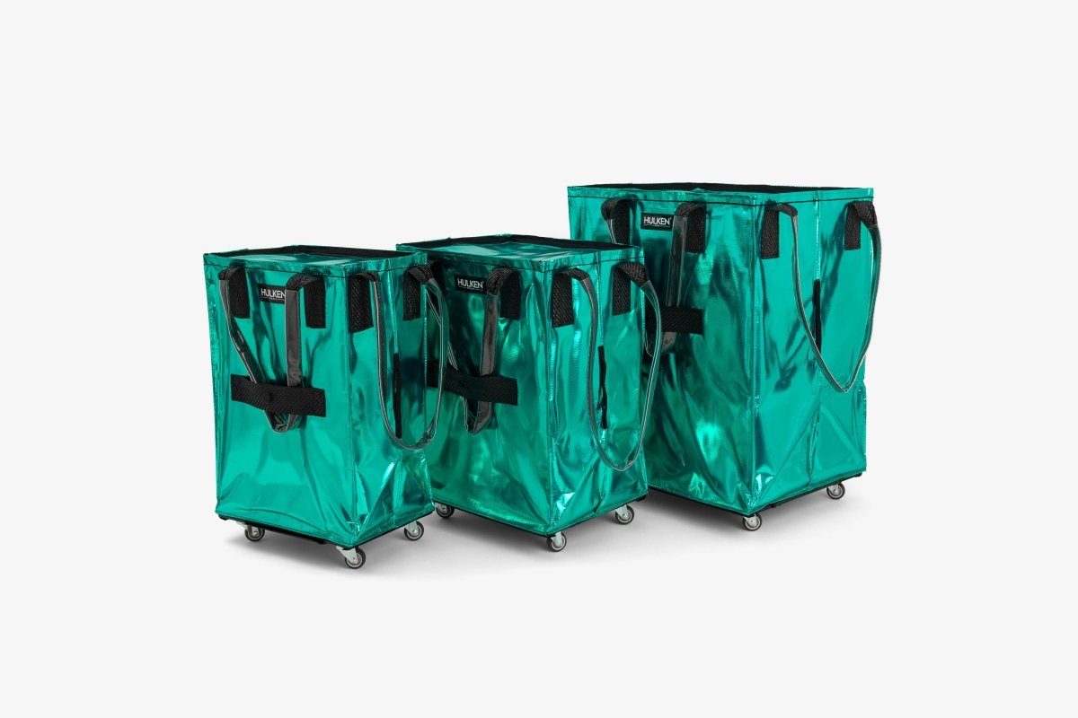 Small Hulken Bag in teal with a sleek design, featuring a compact shape and sturdy strap for everyday use.