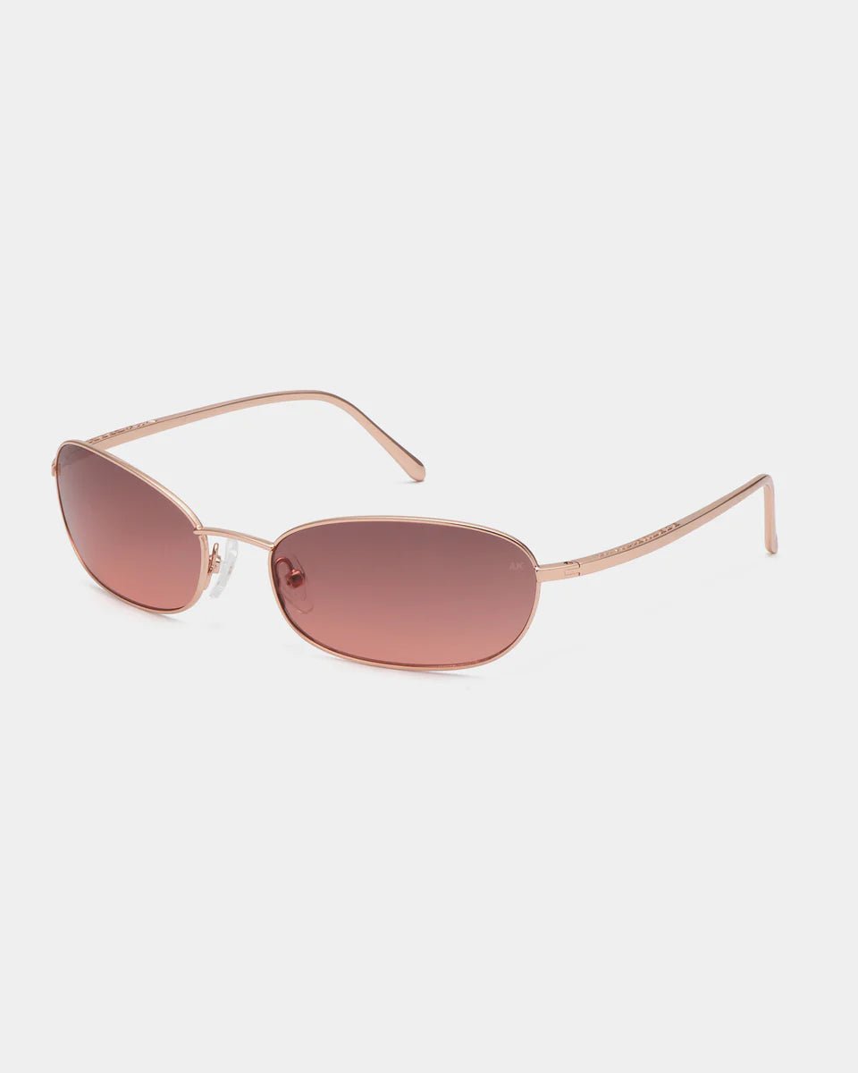 Gold rose Jack sunglasses by A. Kjaerbede featuring stylish frames and tinted lenses, perfect for a trendy, sophisticated look.