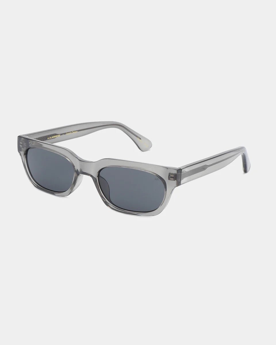 Grey-transparent A. Kjaerbede Bror sunglasses with sleek frame and tinted lenses, stylish eyewear for sun protection.