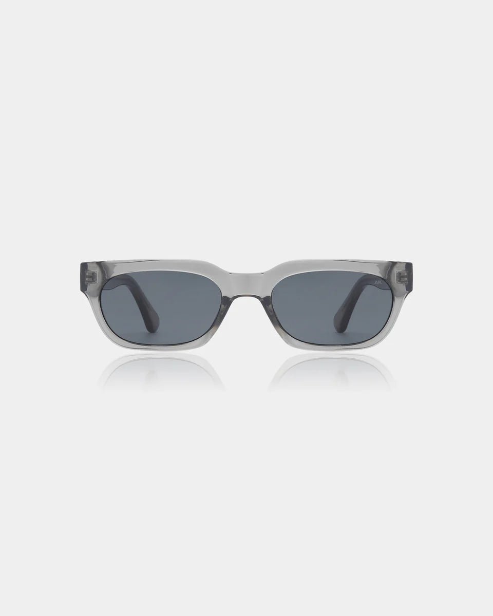 Grey transparent Bror sunglasses by A. Kjaerbede with round frames and tinted lenses.