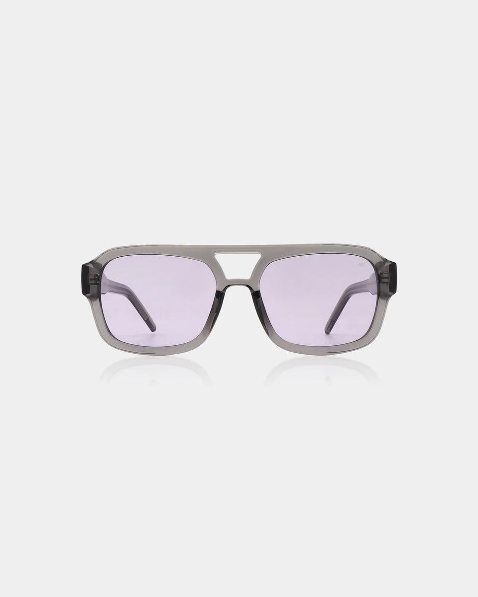 Grey transparent Kaya sunglasses by A. Kjaerbede with sleek, modern design and tinted lenses.