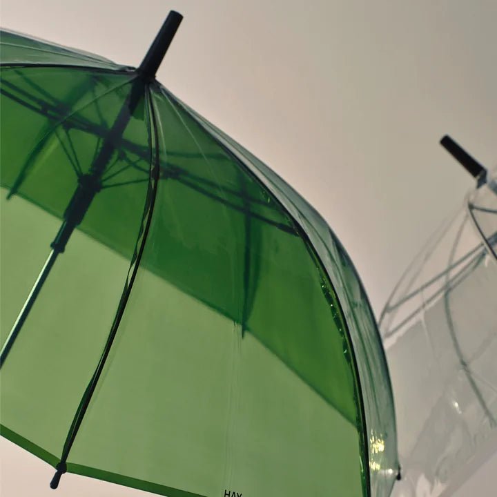 HAY Canopy Umbrella with a fabric canopy and sturdy frame, perfect for outdoor shading and stylish patio decor.