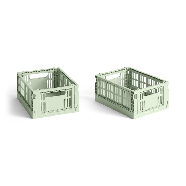 Set of two HAY Mini Colour Crate storage bins in vibrant colors for organization and versatile use.