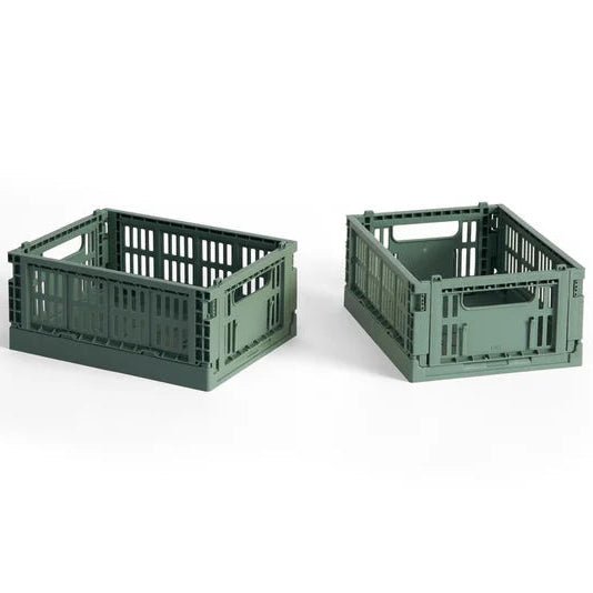Set of two HAY Mini Colour Crate storage bins in vibrant colors for organization and home decor.