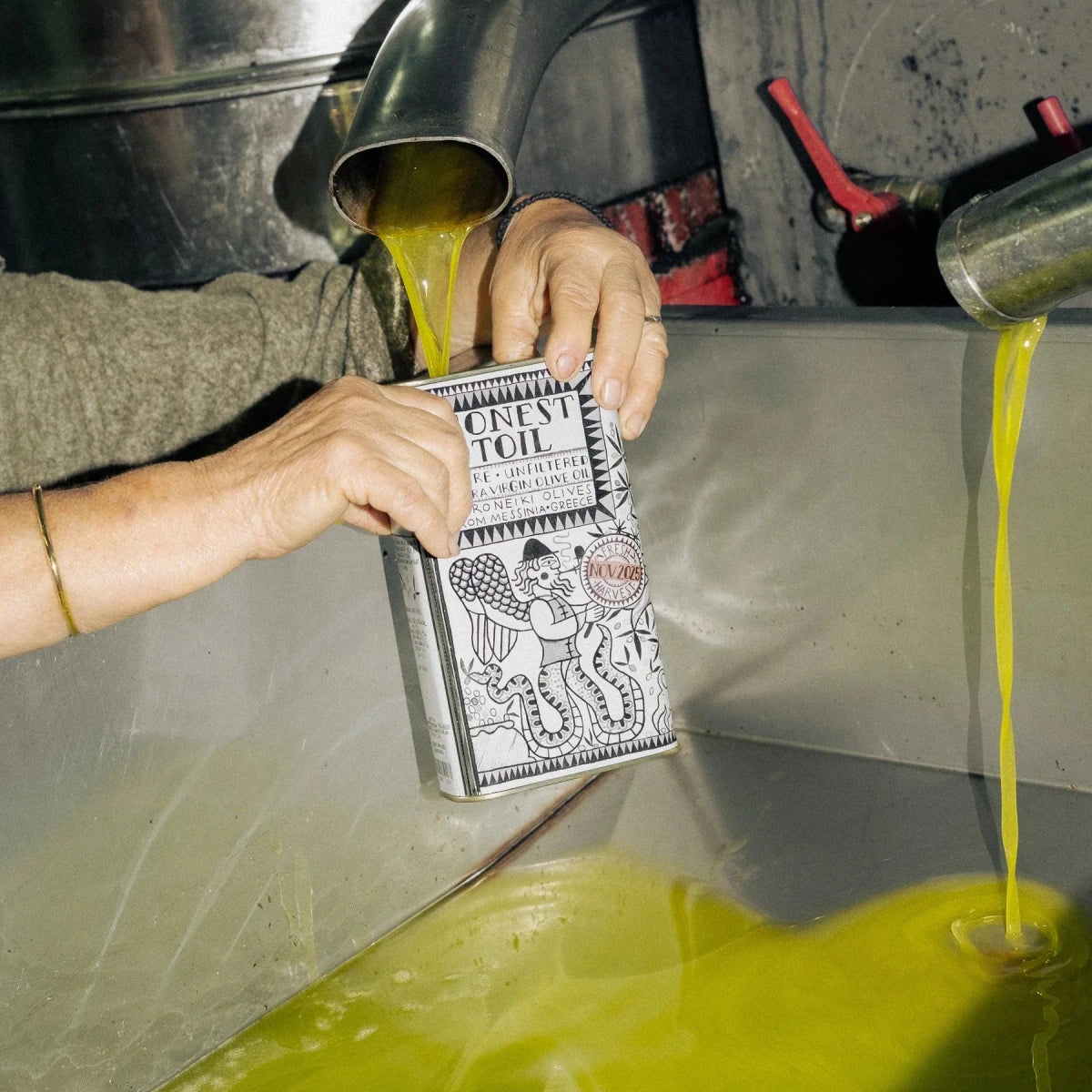 1LTR can of Honest Toil UK extra virgin olive oil from Nov 2025 harvest, showing a metal can with olive oil label.