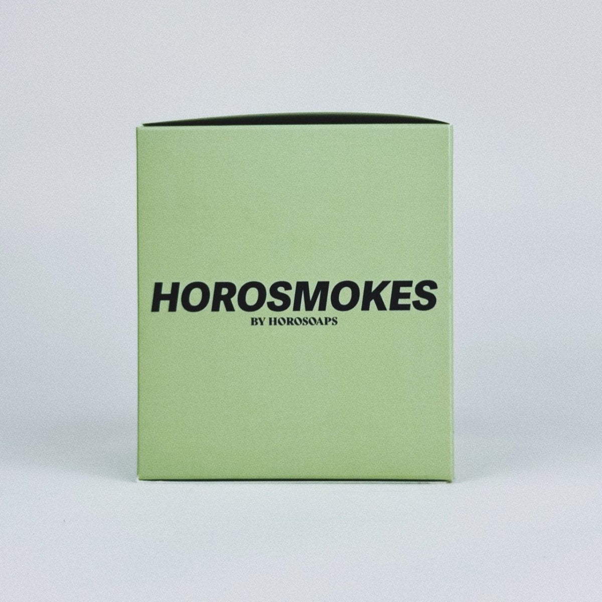 Horosoaps Taurus Horosmokes Candle with a sleek glass jar and zodiac-themed design, perfect for astrology-inspired decor.