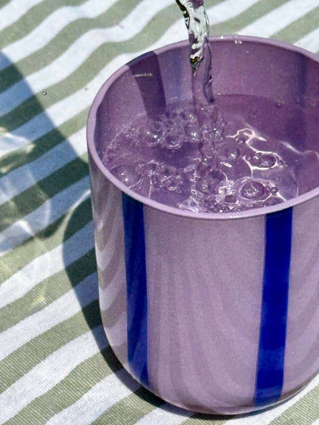 MÆGEN Atina Glassware set with lilac and navy-colored glasses, elegant design for stylish beverage serving.