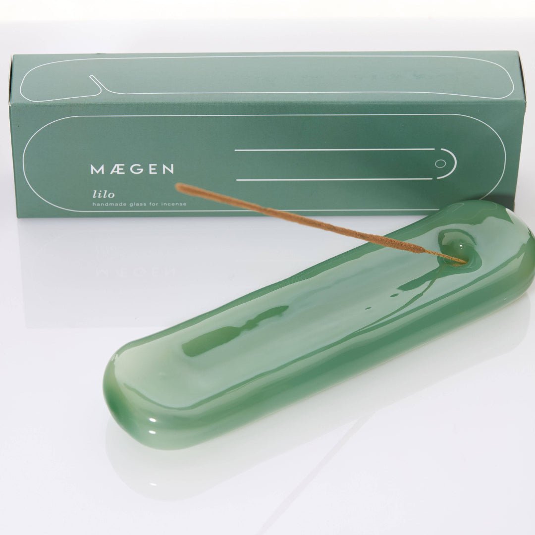 Sea green Lilo incense holder by MÆGEN, featuring a sleek, modern design with a hollow interior for holding incense sticks.