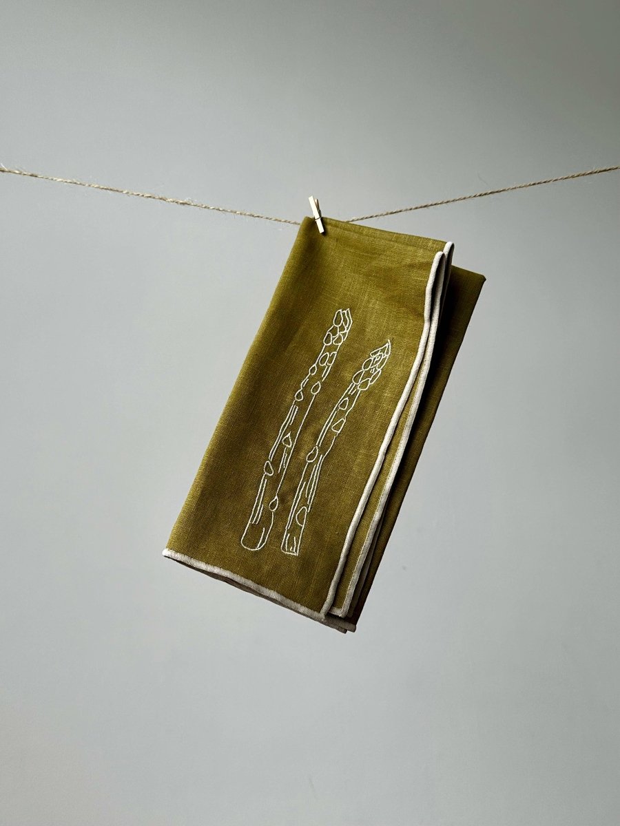 Set of 2 linen blend napkins with asparagus design by MÆGEN, featuring natural fabric and elegant botanical print.