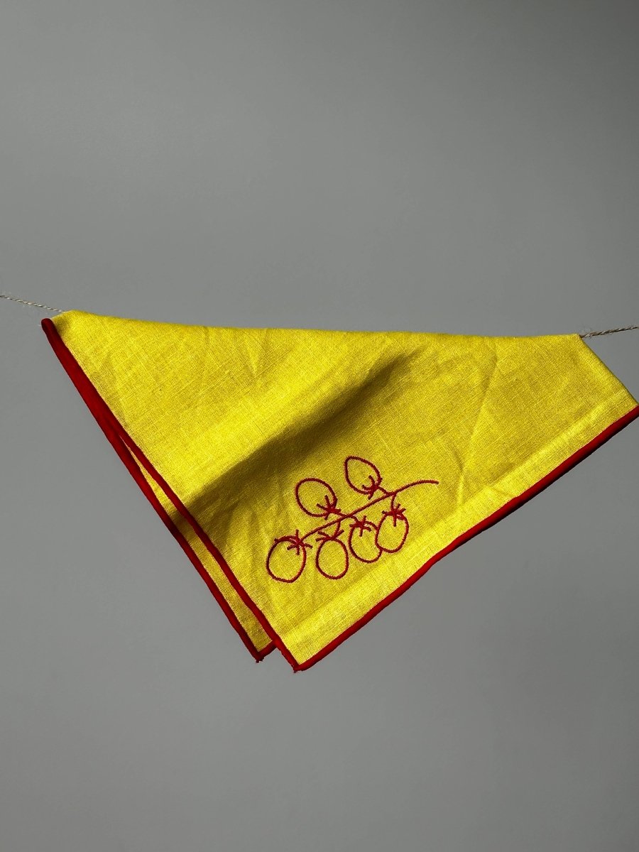 Set of two linen blend napkins featuring vine tomato print by MÆGEN, ideal for table decor or casual dining.