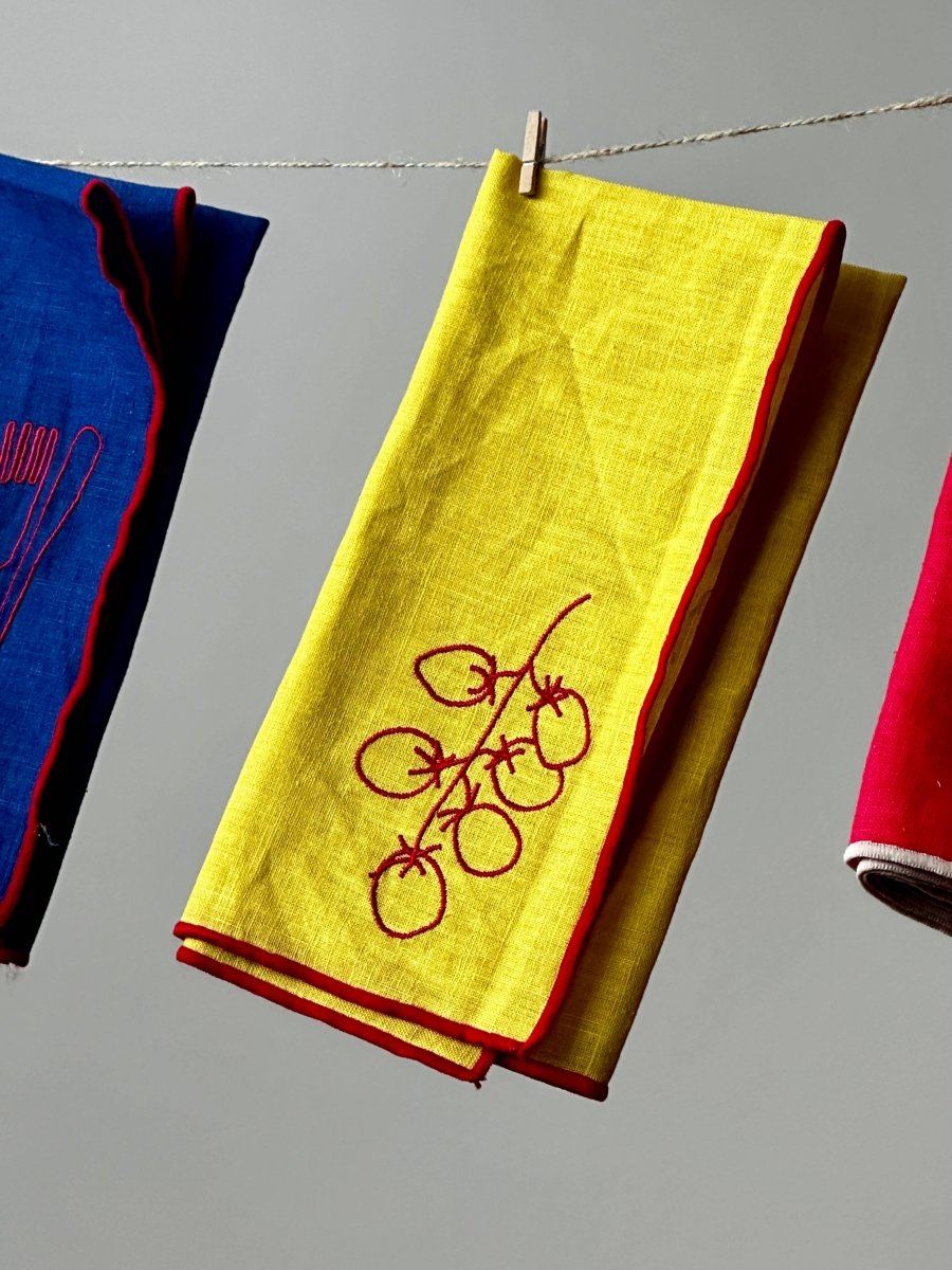 Set of 2 MÆGEN linen blend napkins featuring a vine tomato pattern, perfect for dining and table decor.