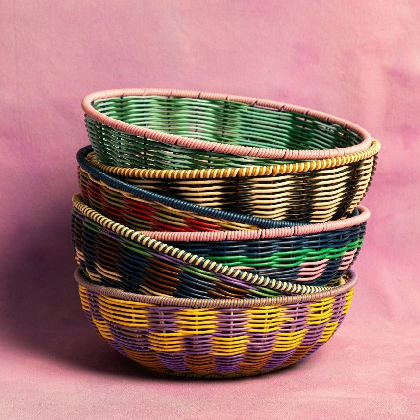 Maegen woven bowl in pink and navy with a textured woven design, perfect for decorative or functional use.