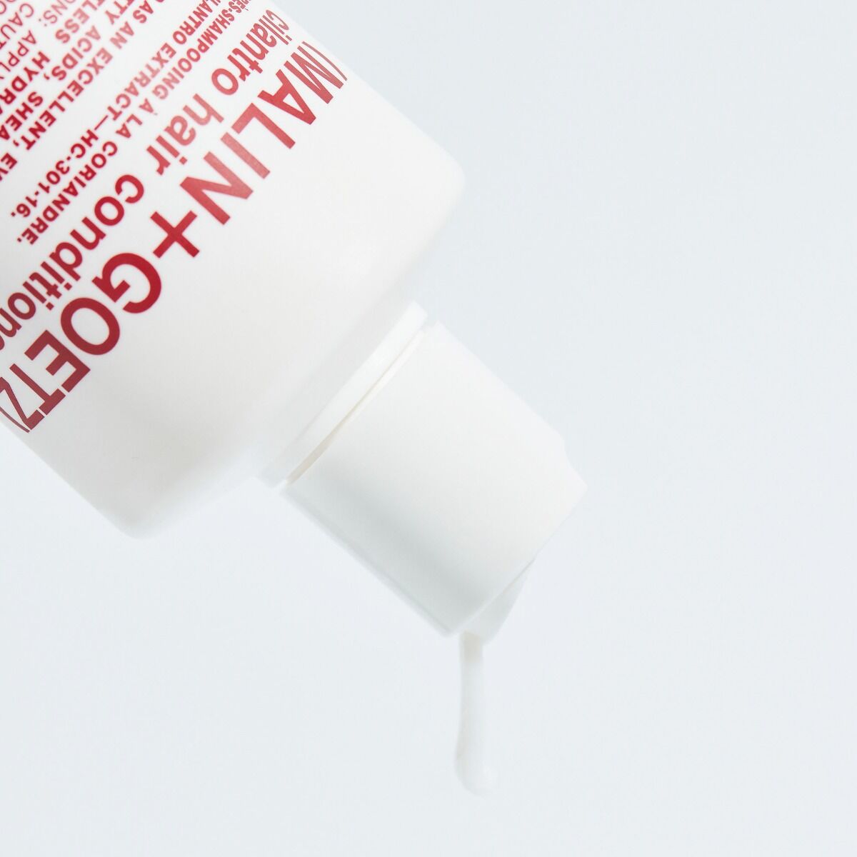 Malin+Goetz Cilantro Hair Conditioner 236ml bottle, showcasing sleek packaging for nourishing hair care.