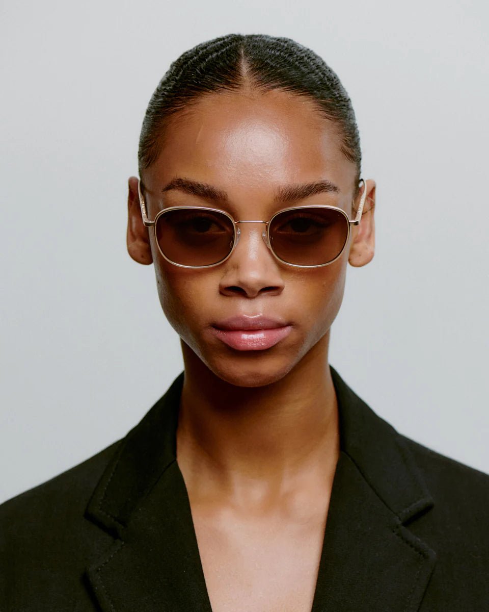 Matte gold Hello sunglasses by A. Kjaerbede with sleek frame and tinted lenses, stylish and modern eyewear for sun protection.