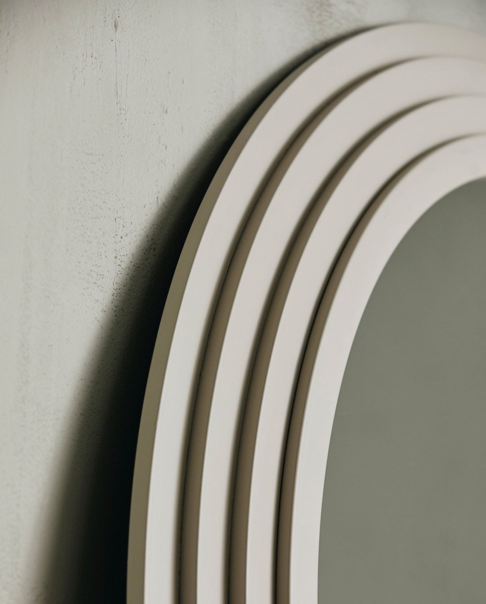 Nordal A/S FALCO Sand mirror with a sleek design, featuring a round shape and neutral sand-colored frame.