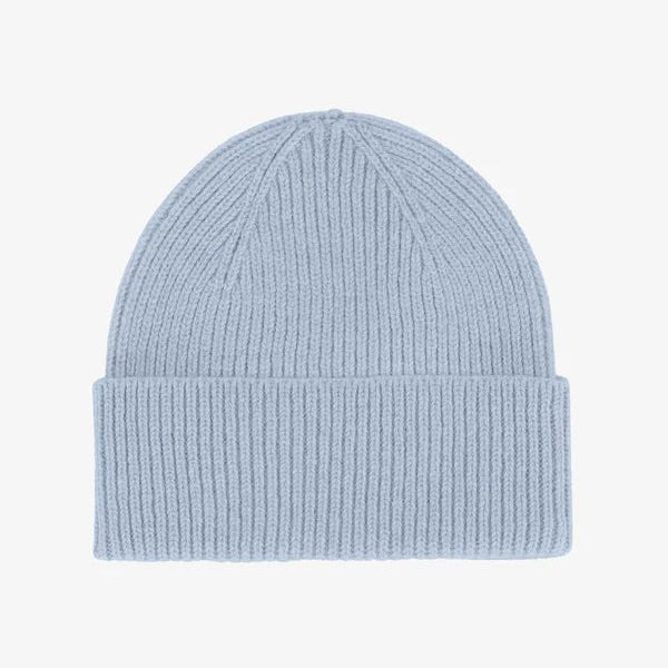Light blue knit beanie on a light gray background