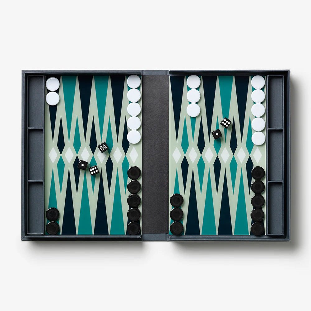 Printworks Art of Backgammon set with detailed wooden board and game pieces, showcasing a classic backgammon game design.