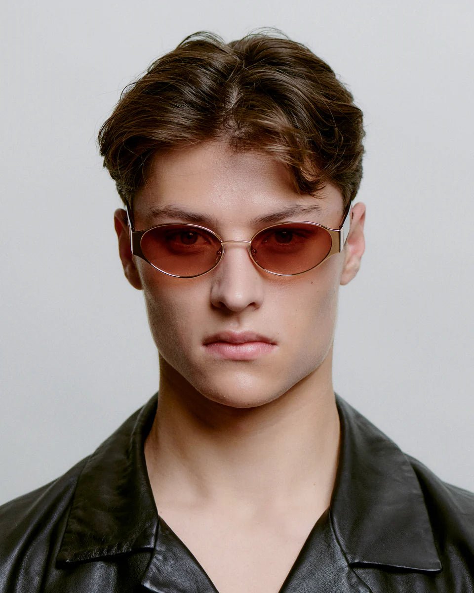 Rosegold Havana Bella sunglasses by A. Kjaerbede with stylish frame and dark tinted lenses, displayed on a white background