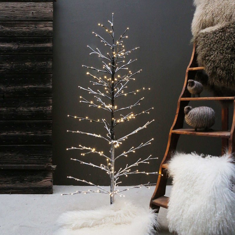 Pre-order LED snow-covered Christmas tree by Fiorira un Giardino, 180cm tall with 479 LED lights, suitable for indoor and outdoor use.