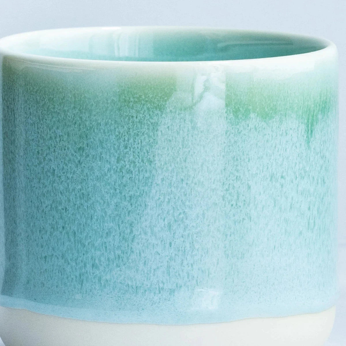 Studio Arhoj Finland Forest Green ceramic Quench Cup with a vibrant green glaze and handcrafted design.