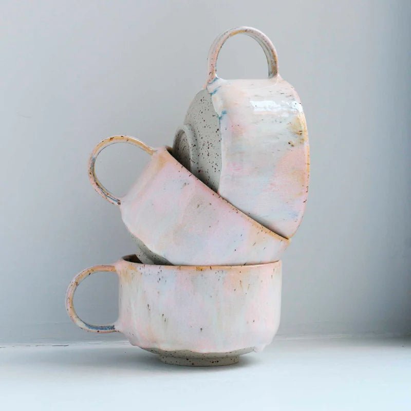 Studio Arhoj Zephyr ceramic Mion mug with a smooth, glazed finish and unique artistic design.