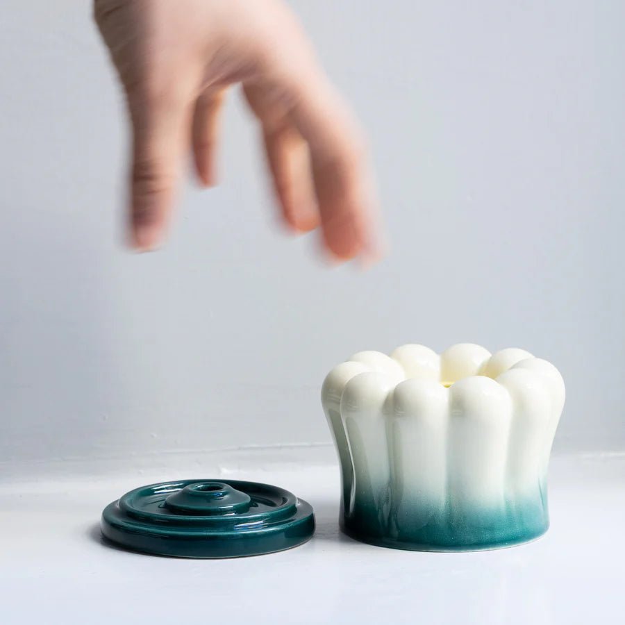 Studio Arhoj ceramic smoke flower incense holder featuring a detailed, artistic ceramic design with a flower-shaped opening.