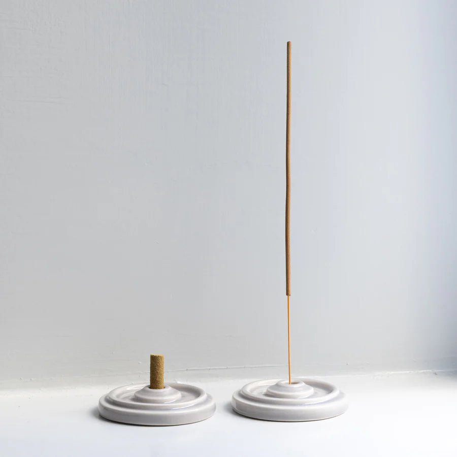 Ceramic Smoke Flower Incense Holder by Studio Arhoj, featuring a colorful, flower-shaped design for holding incense sticks.